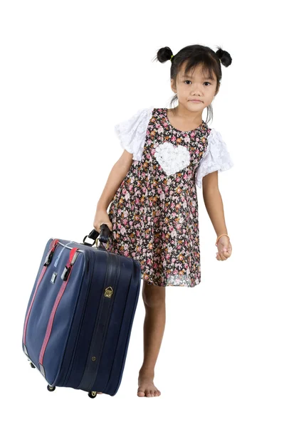 Kleines Mädchen mit großem Koffer — Stockfoto