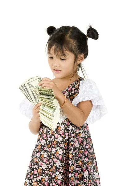 Küçük kız para sayıyor. — Stok fotoğraf