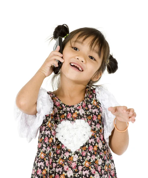 Glad liten tjej på telefonen — Stockfoto
