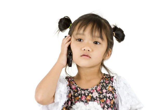 Lilla flicka i telefon — Stockfoto