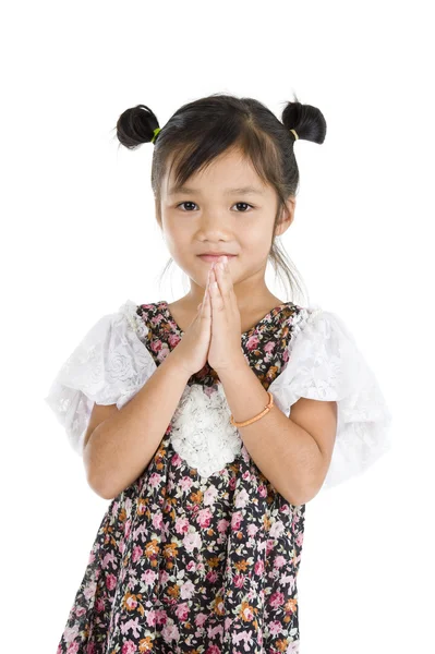 Menina asiática bonito com as mãos dobradas — Fotografia de Stock