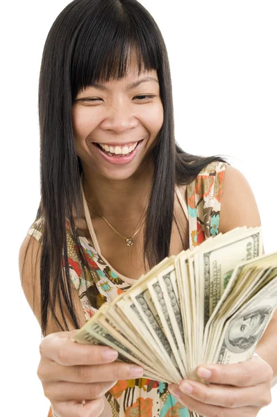 Счастливая женщина с кучей денег — стоковое фото