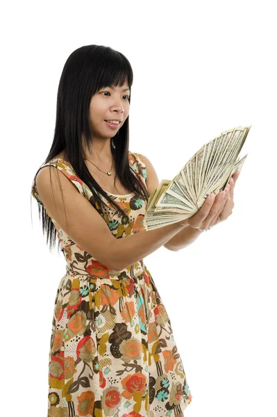 Woman starring at money — Stock Photo, Image