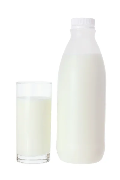 Glas und Flasche Milch — Stockfoto