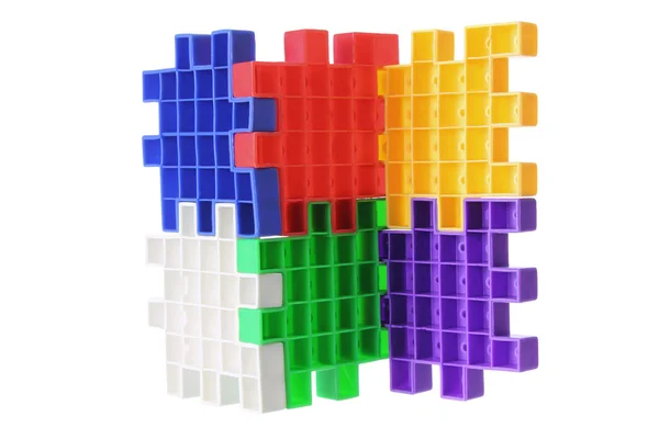 Pezzi puzzle di plastica — Foto Stock