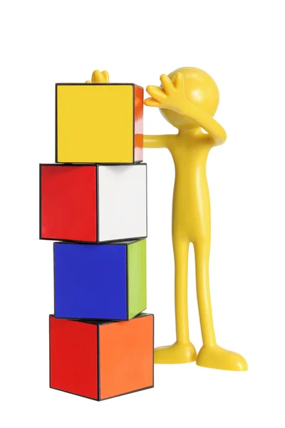 Miniature Figure with Cubes — Stock Photo, Image