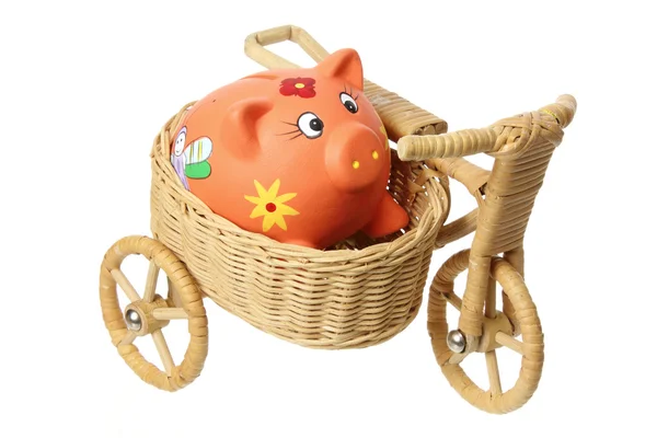 Piggybank minyatür motosiklet sepeti üzerine — Stok fotoğraf