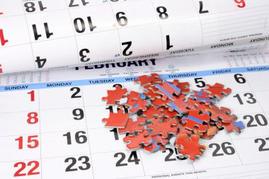 Jigsaw Puzzle on Calendar clipart