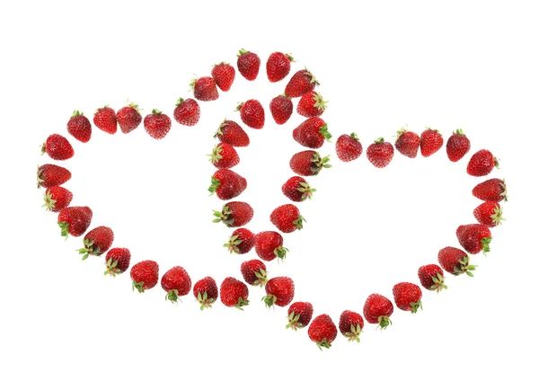 Erdbeeren in Herzform angeordnet — Stockfoto