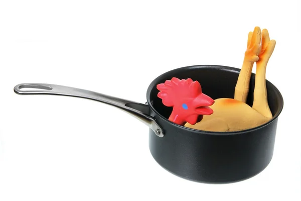 Jouet poulet en caoutchouc dans une casserole — Photo