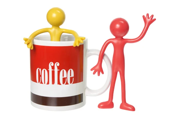 Kávu hrnek a gumy postavy — Stock fotografie