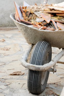 Wheelbarrow with waste clipart