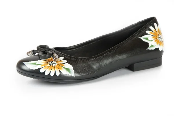 Vrouwen schoenen met gedrukte bloem — Stockfoto