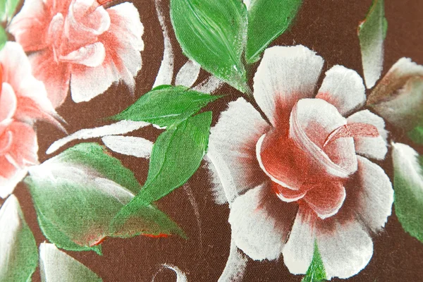 Flower print on brown fabric — Stock Photo, Image