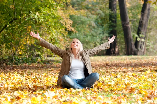 Young blond woman cheering — Stock Photo, Image