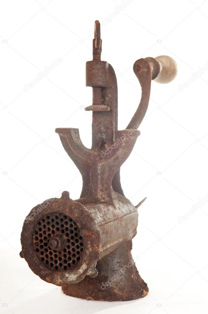 Old rusty meat grinder