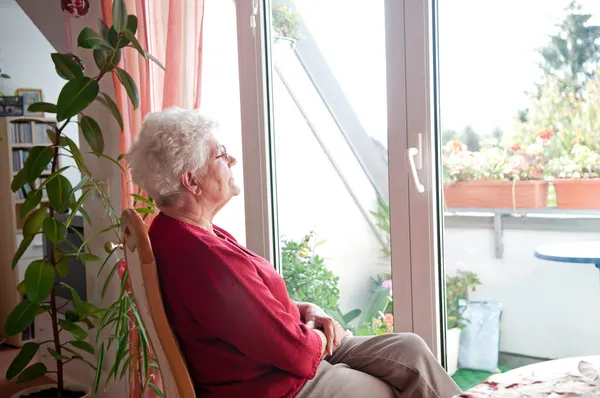 Lonely old woman — Stock Photo, Image