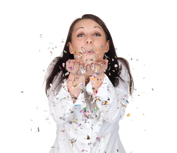 stock image Woman blowing confetti