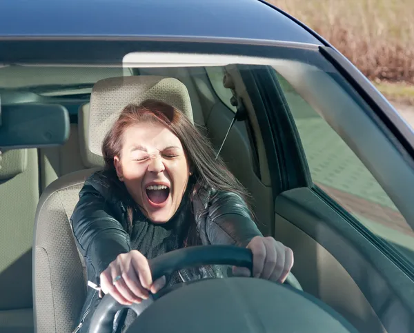 Woman screaming in the car — Stock Photo, Image