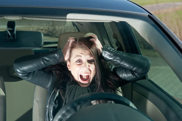 Woman screaming in the car — Stock Photo, Image