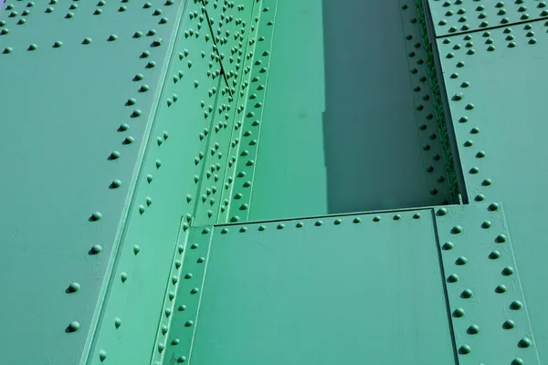 Grüner Stahl und Nieten — Stockfoto