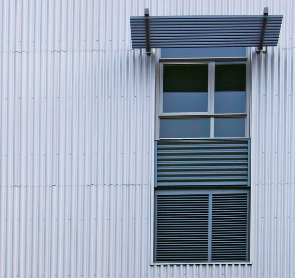 Modern widow on Corrugated wall — Stok fotoğraf