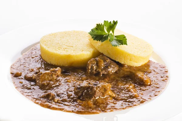 Polenta with goulash — Stock Photo, Image