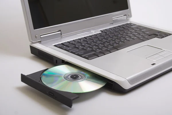 Ноутбук і диск — стокове фото