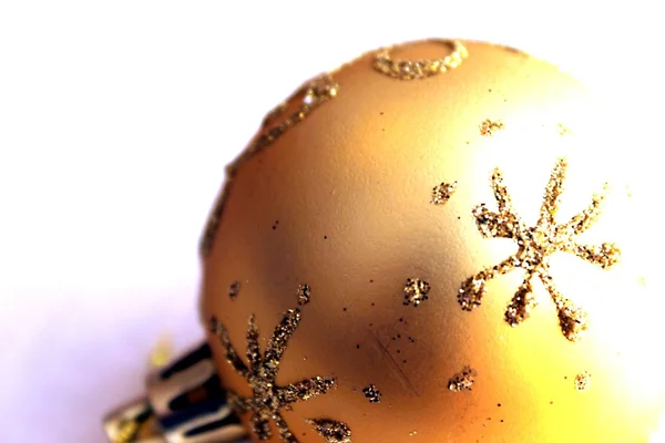 Golden bright christmas sphere — Stock Photo, Image