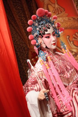 Chinese opera dummy and red cloth as text space ,it is a toy,not clipart