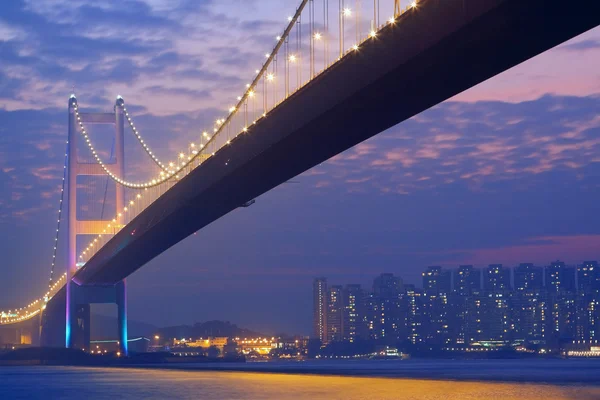 Long bridge in sunset hour — Stock Photo, Image