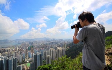 Photographer take photo of city clipart