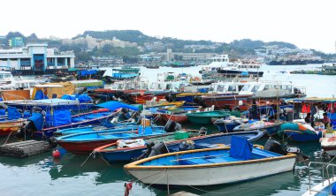 Fishing and house boats anchored in Cheung Chau harbour. Hong Ko clipart