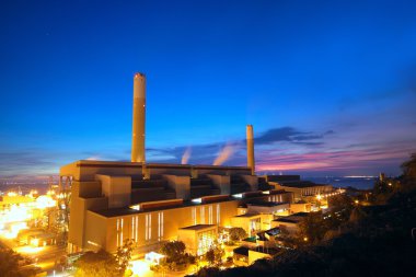 Coal power station and night blue sky clipart