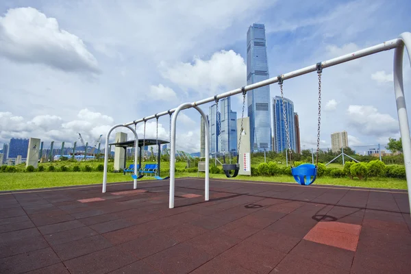 Swing in city at day — Stock Photo, Image