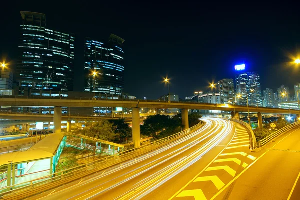Highway at night in modern city — Stock Photo, Image