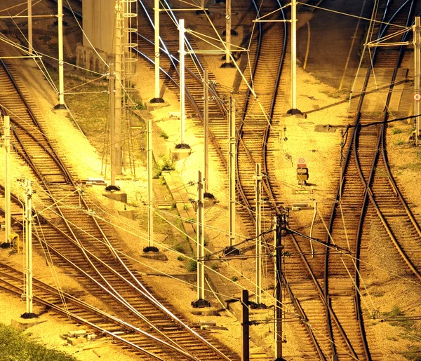 Train tracks in hongkong by night. — Stock Photo, Image