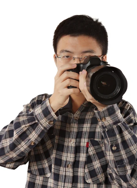 Чоловічий фотограф тримає камеру — стокове фото