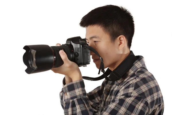 Male photographer holding camera — Stock Photo, Image