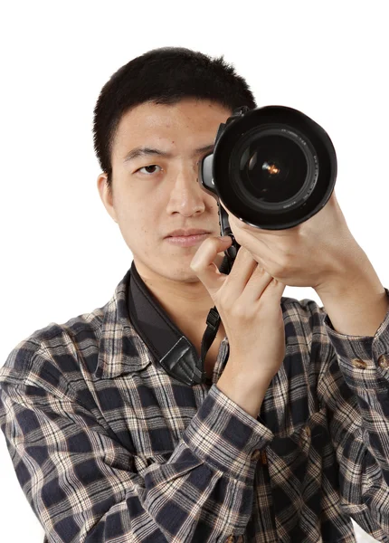 Hombre fotógrafo celebración de cámara — Foto de Stock