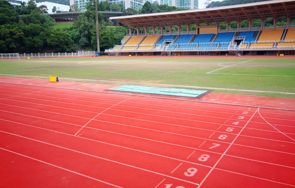Stadium huvudläktaren och löparbana — Stockfoto