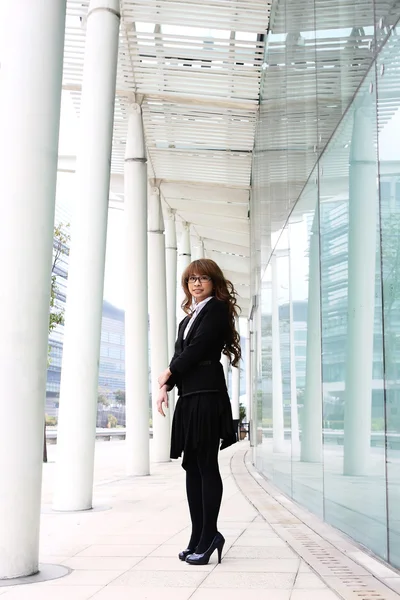 stock image Portrait of a young business woman in an office