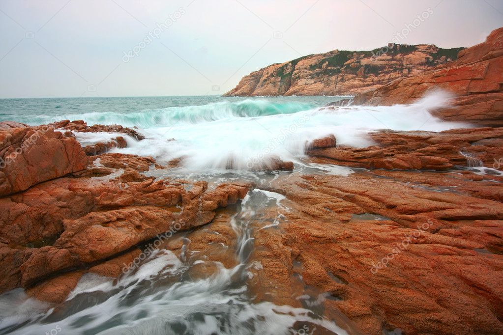 Rocky sea coast and blurred water in shek o,hong kong