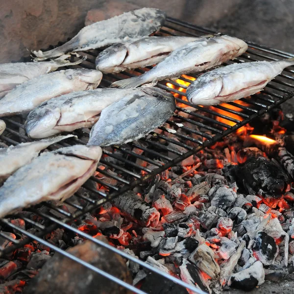 stock image Grilled fish on the barbecue