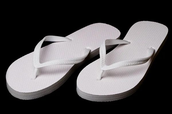 Белые сандали — стоковое фото