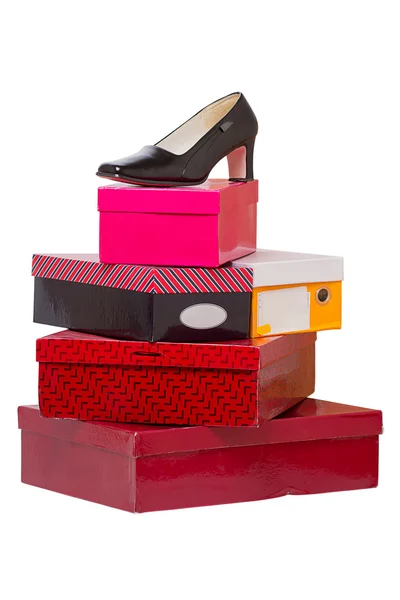 Женская обувь и коробки — стоковое фото