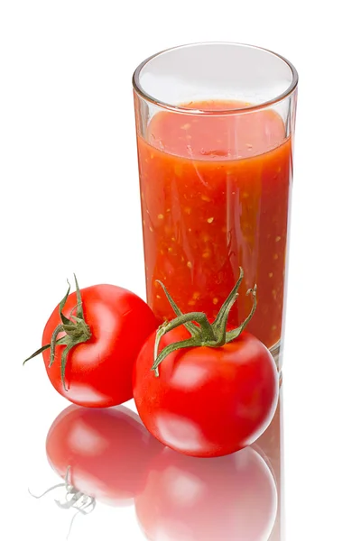 Fresh tomatoes and juice — Stock Photo, Image
