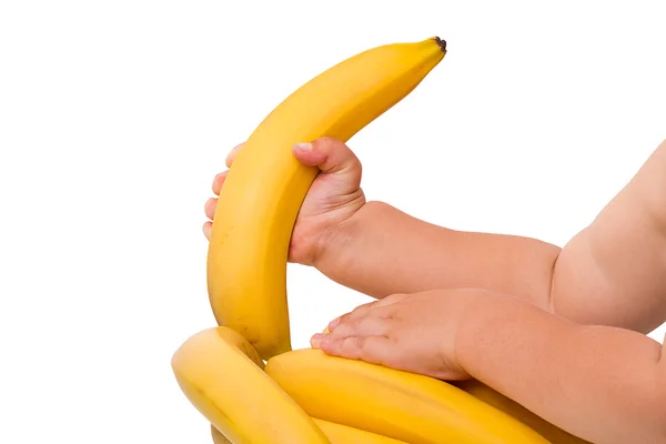 Kind zieht eine Banane — Stockfoto