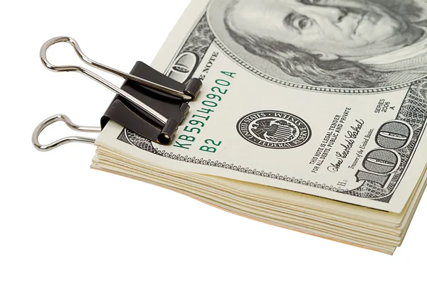Large paper clip and dollars — Stock Photo, Image