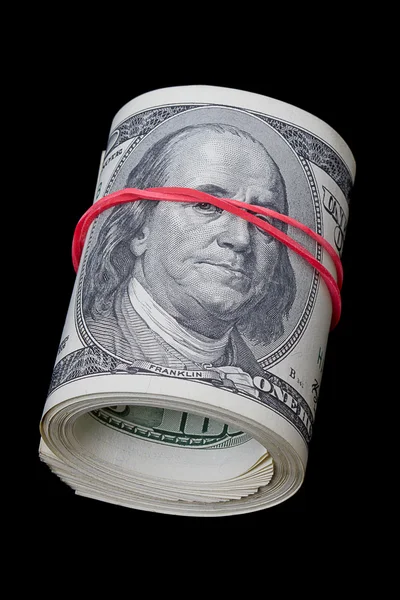 Rolo de dólar em preto — Fotografia de Stock